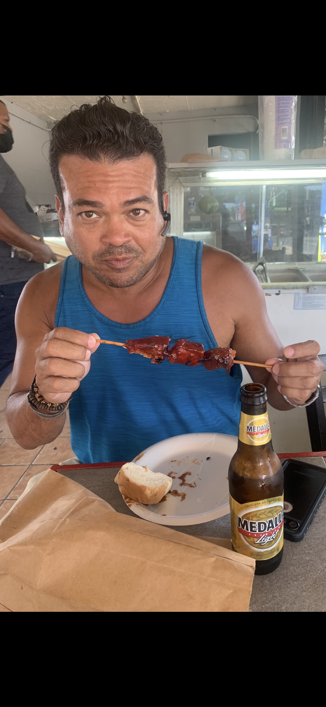 Oliver Maldonado enjoying local food in Piñones, Puerto Rico.