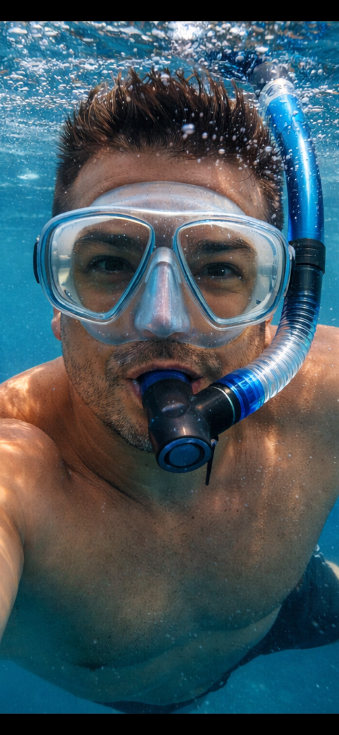 Oliver Maldonado snorkeling in Condado Lagoon, Puerto Rico.